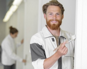 painter painting door frame