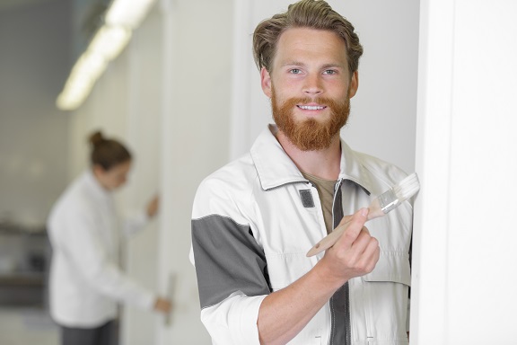 painter painting door frame