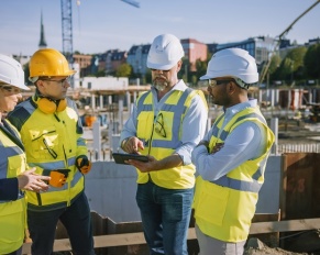 team of contractors at construction site