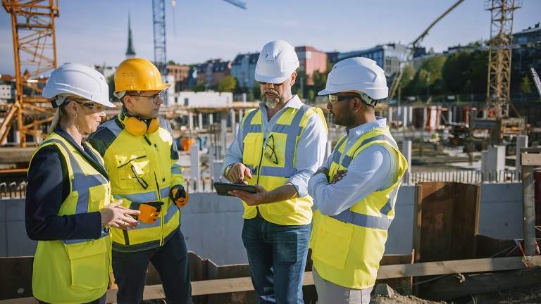 team of contractors at construction site